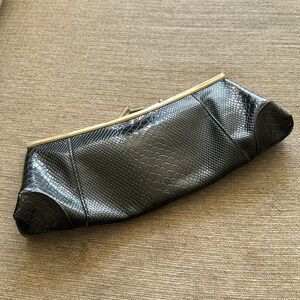 Vintage black with gold kiss lock closure leather clutch bag